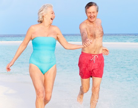 Happy senior couple in swimsuit
