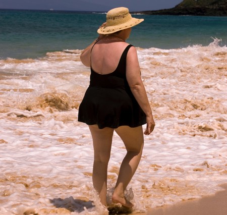 Overweighted old woman in swimsuit