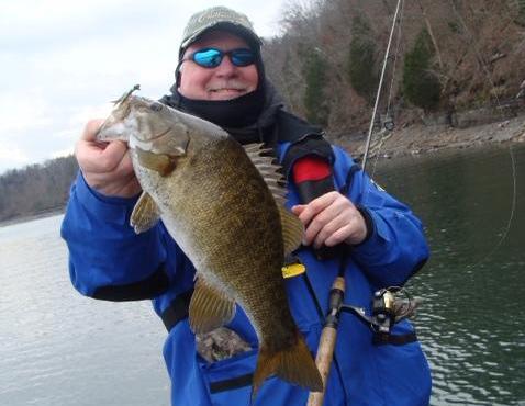 Stephen Headrick catches smallmouth bass with a float and fly hair jig