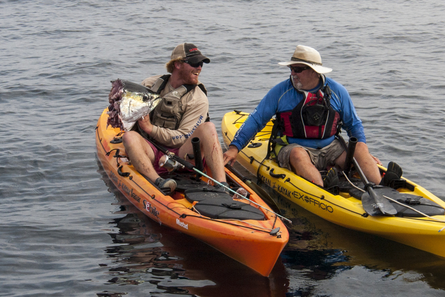 Jordan Ellis, Jim Sammons and what the Shark left them. Photo: Jeffrey Pierce