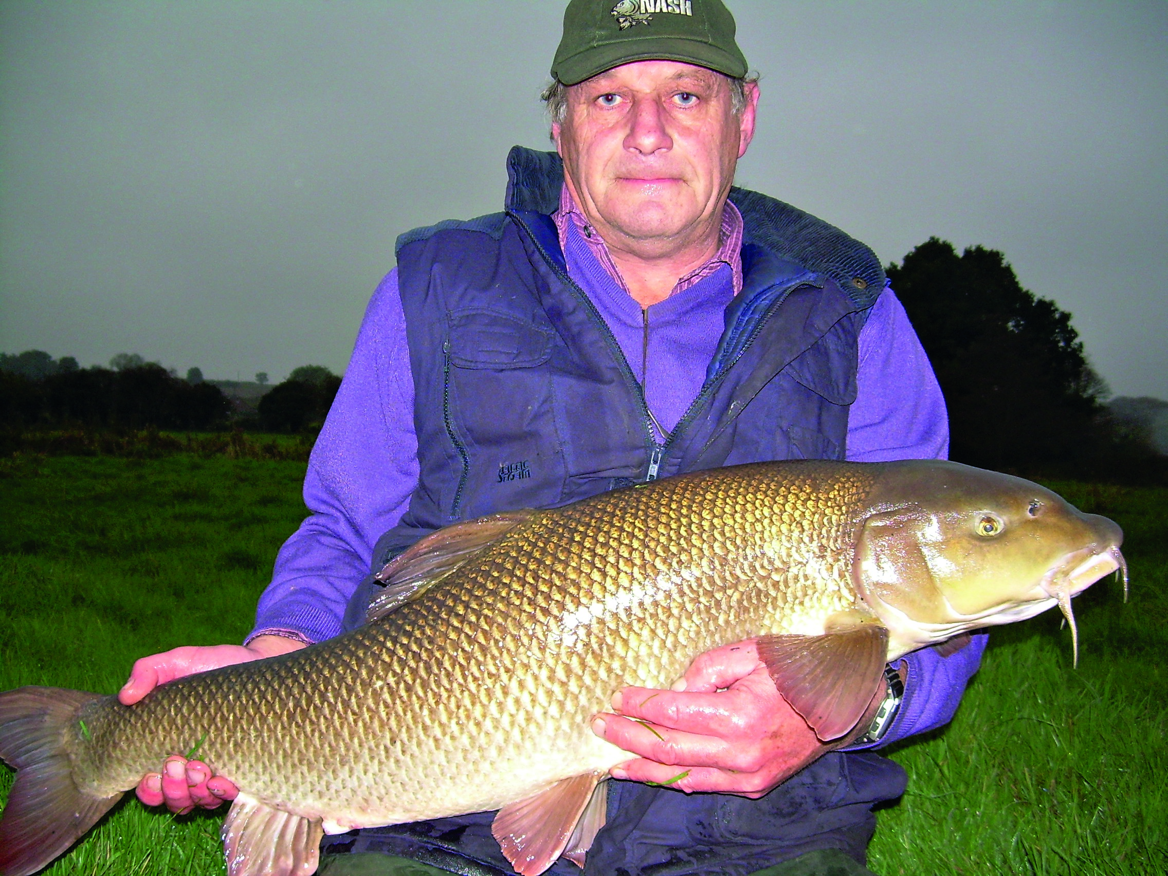 This giant River Wensum barbel, reported at the time at 21 lb 2 oz, sits at the top of the barbel Top 50. It is not however the official British barbel record!