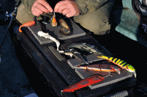 On top of Steve’s tackle box he has pads of foam. These are used for temporarily holding lures. Keeping the hooks in the foam stops them falling on the bottom of the boat or catching in other items such as nets or clothing.