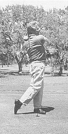 Swing time-elapse - Swing the club through the ball and toward the target.