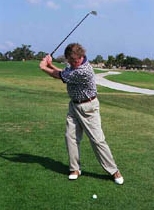 Photo showing backweighted sway at the top of swing