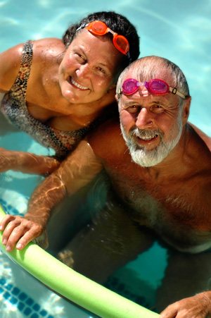 A healthy senior couple that enjoys swimming