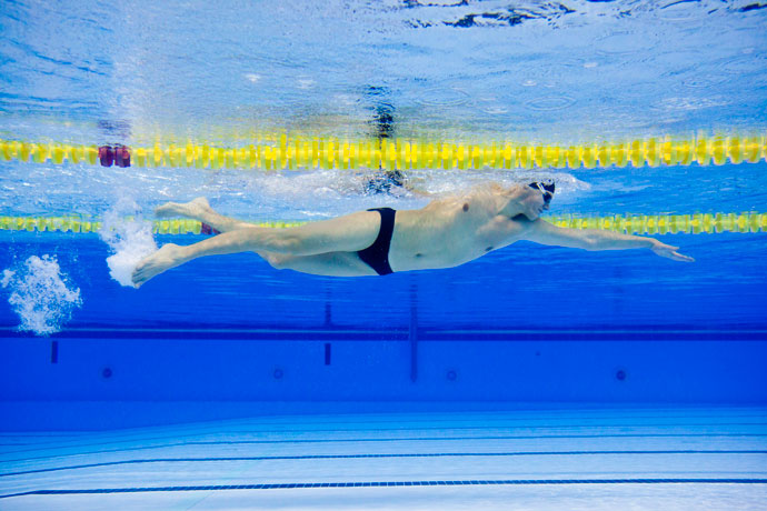 A man swimming freestyle