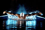 A butterfly stroke swimmer