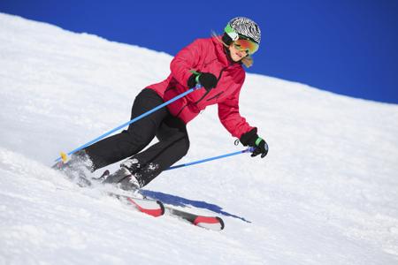 Women snow skier skiing