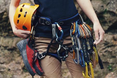 Standing with climbing equipment