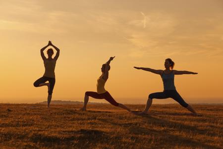 Three young women exercise