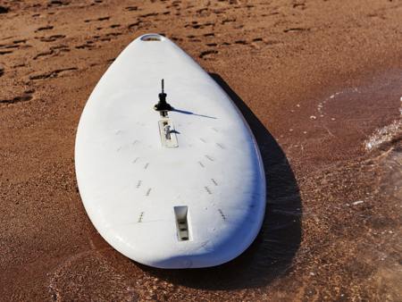 Surfboard on beach