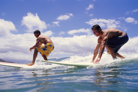 Men Surfing Sea