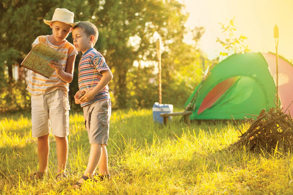 Camp in the tent - two brothers on the camping