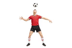 football player juggling the ball