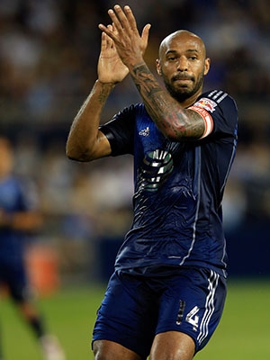 Thierry Henry Applauds After A Favorable Call